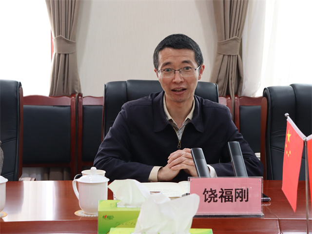 鄧華會見宜賓市供銷社黨委書記、理事會主任饒福剛一行